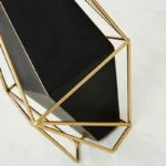 Modern geometric black and gold decorative vase for luxury home decor.