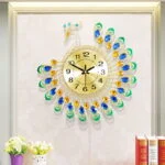 Peacock-themed decorative wall clock with colorful feathers in a modern home setting.