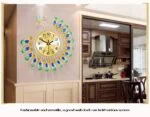 Peacock-themed decorative wall clock in a modern kitchen setting.