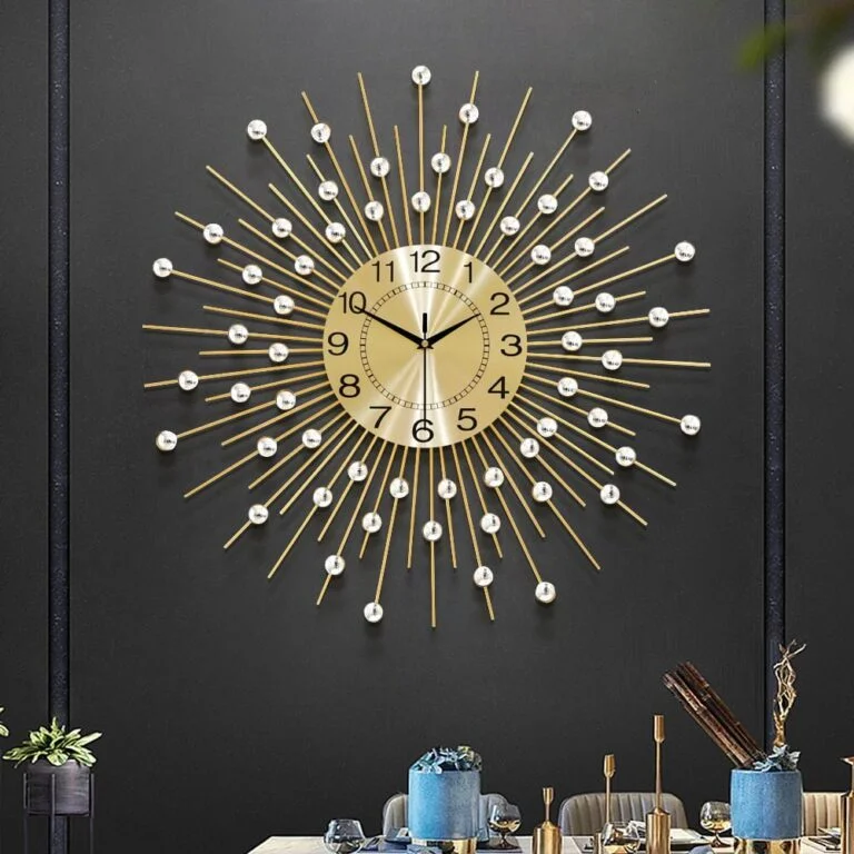Modern luxury wall clock with gold and pearl accents on a dark wall, enhancing home decor.
