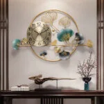 Modern luxury wall clock with floral metal design and decorative accents.