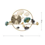 Modern decorative wall clock with gold and teal floral design, perfect for luxury home decor.