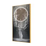 Modern LED wall art with deer and tree design, featuring a clock and illuminated elements.