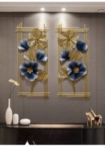 Luxury gold and blue floral metal wall art in modern home decor setting.