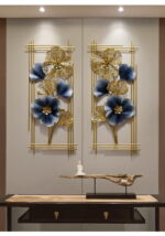 Luxury gold and blue floral metal wall art in modern home decor setting.