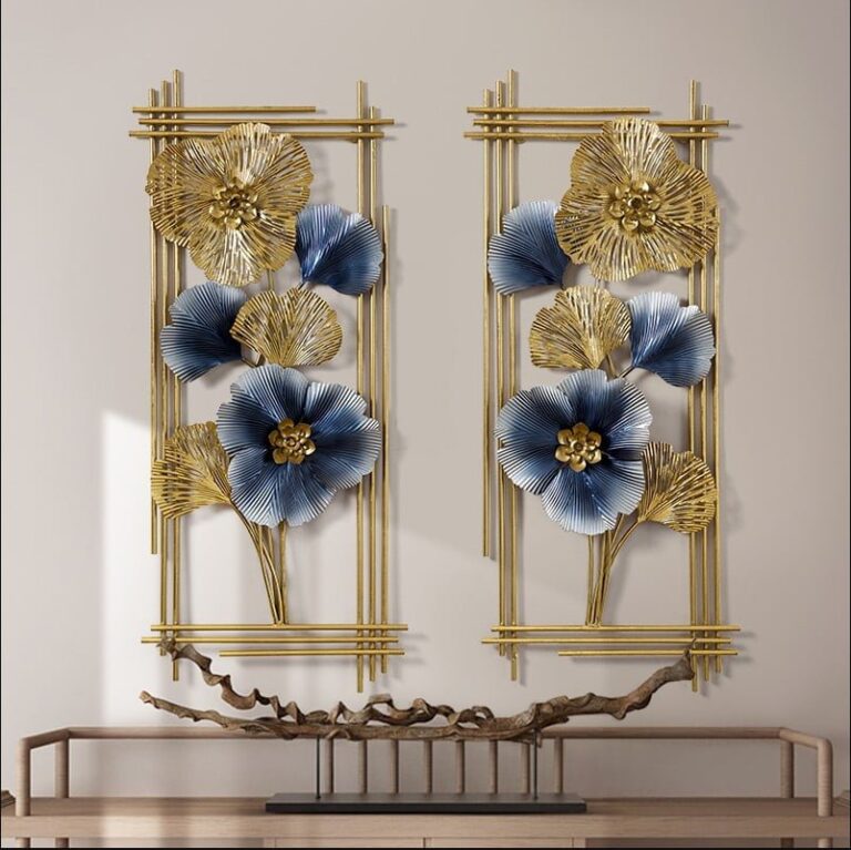 Gold and blue floral metal wall art in a modern home setting.