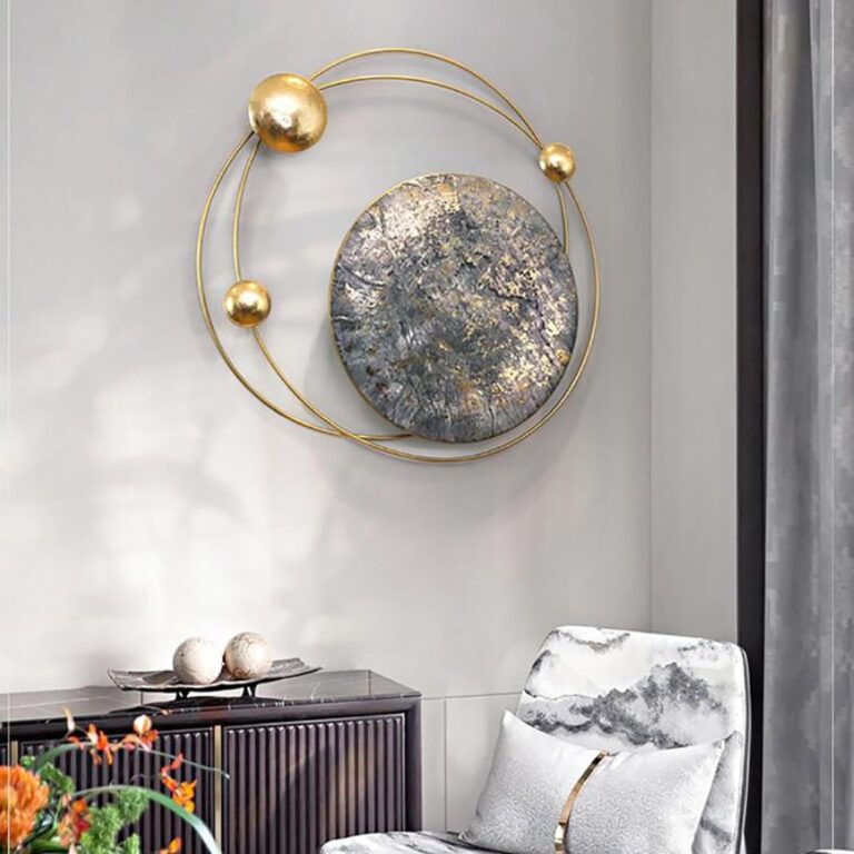 Modern luxury wall art with gold accents in a stylish living room setting.