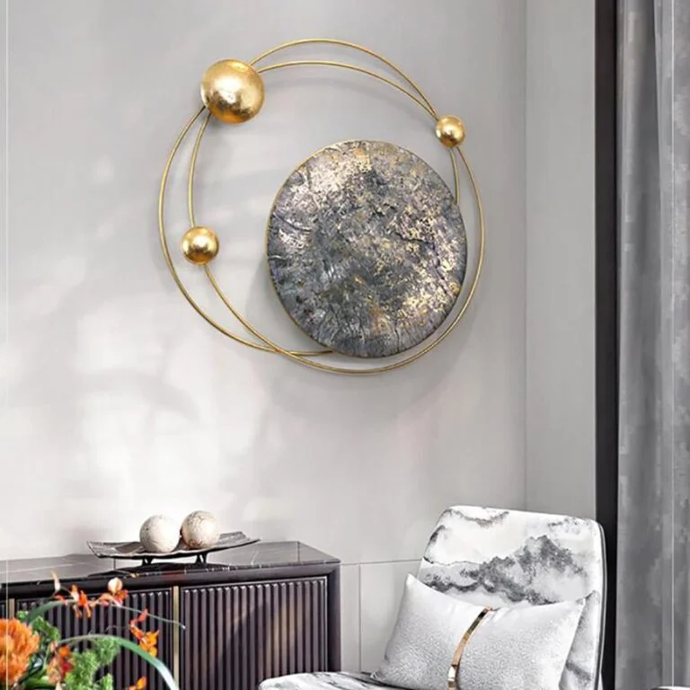 Modern luxury wall art with gold accents in a stylish living room setting.