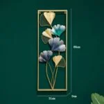 Modern gold and teal metal wall art with leaf design, perfect for luxury home decor.