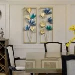 Modern luxury wall art with floral design in dining room setting.