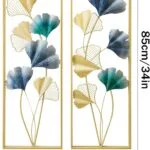 Modern metal wall art with gold and blue leaf design, 85cm tall.