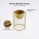 Modern minimalist gold metal planter with removable pot for home decor.
