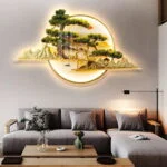 Illuminated modern wall art with nature scene above a stylish living room sofa.