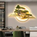Illuminated modern wall art with tree and mountain design in a luxury home setting.