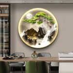 Illuminated round wall art with nature scene and LED lighting in modern home decor setting.
