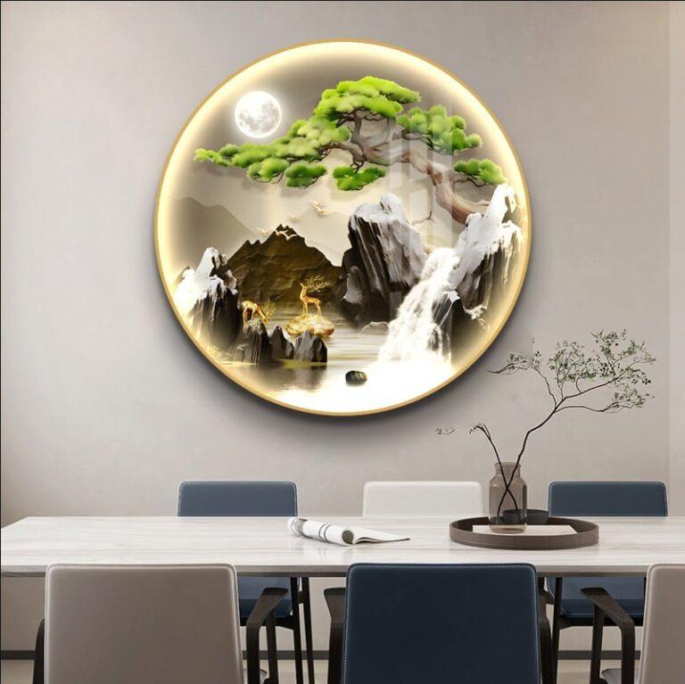 Illuminated round wall art with nature scene and LED lighting in a modern dining room.