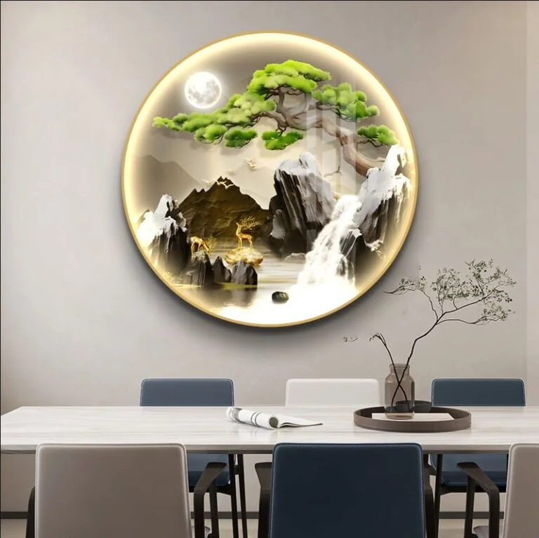 Illuminated round wall art with nature scene and LED lighting in a modern dining room.
