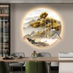Illuminated modern wall art with nature scene in luxury home setting.