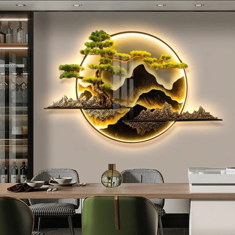 Illuminated modern wall art with mountain and tree design in a luxury home setting.