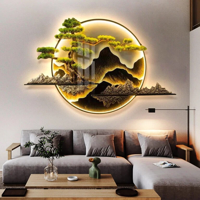 Illuminated modern wall art with nature scene above a stylish living room sofa.
