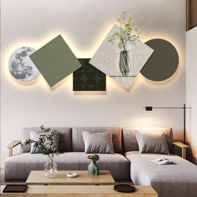 Modern illuminated wall art with geometric shapes and vase design in a luxury living room.