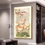Illuminated floral wall art with lotus flowers and cherry blossoms in a modern living room.
