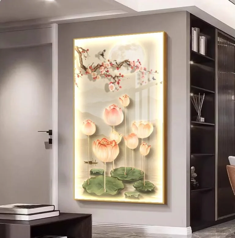 Illuminated floral wall art with lotus flowers and cherry blossoms in a modern living room.