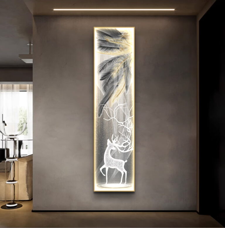 Illuminated modern wall art with deer and feathers in a luxury home setting.
