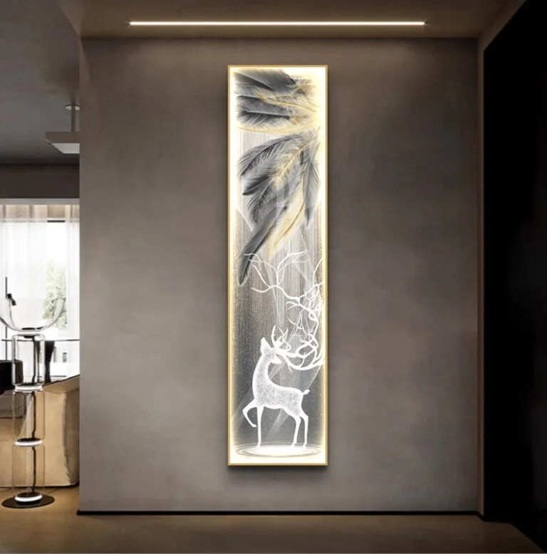 Illuminated modern wall art with deer and feathers in a luxury home setting.