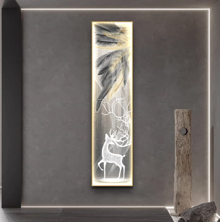 Modern illuminated wall art with deer and feathers in a sleek interior setting.