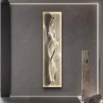 Modern illuminated wall art with abstract design in a luxury home setting.