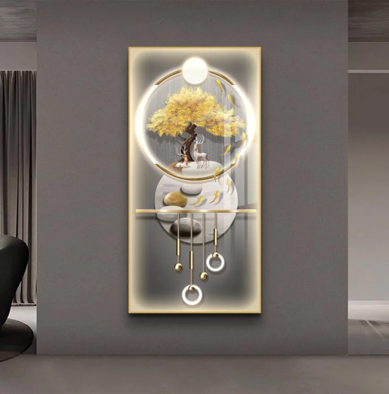 Modern illuminated wall art with tree design and gold accents in a luxury home setting.