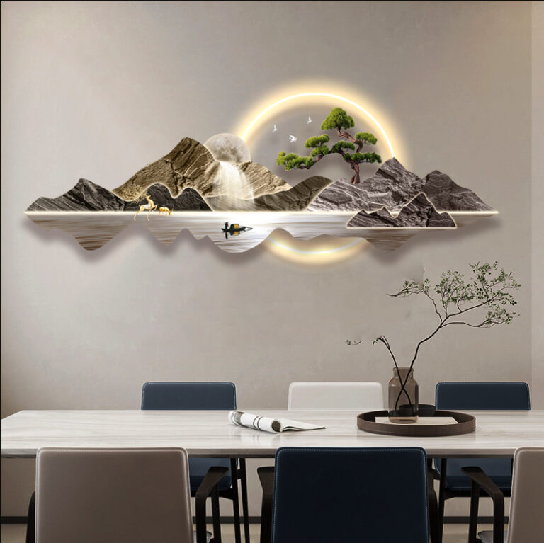 Modern illuminated wall art with mountain landscape and LED lighting in a dining room setting.