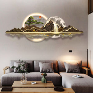Modern illuminated wall art with mountain and tree design in a luxury living room setting.
