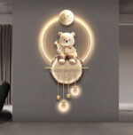 Illuminated wall art with a bear figurine and moon design, modern home decor.