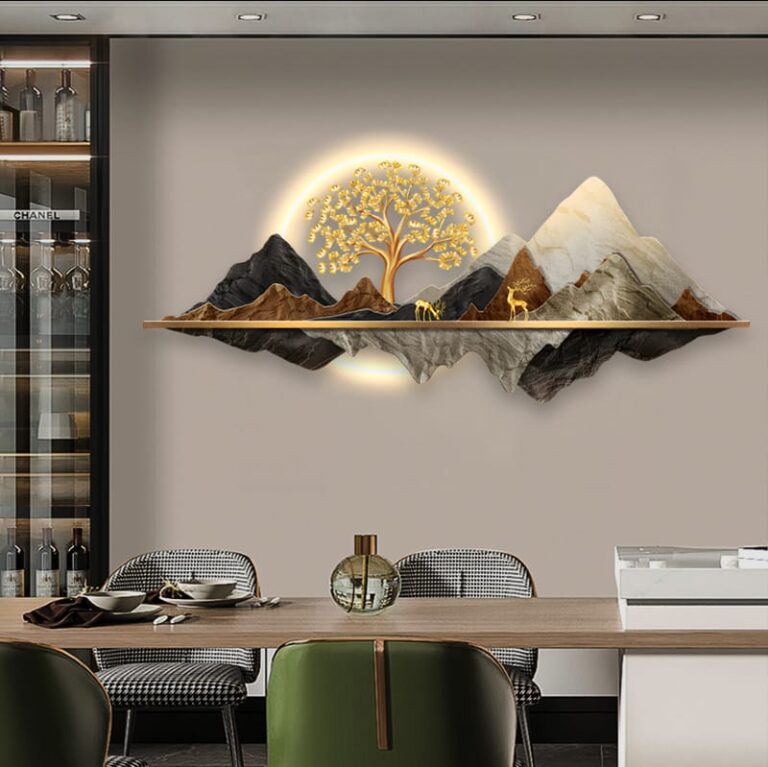 Illuminated mountain and tree wall art in modern dining room setting.