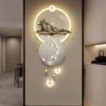 Modern illuminated wall art with circular design and LED lighting in a luxury home setting.
