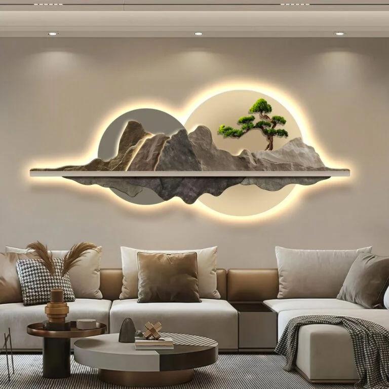 Modern illuminated wall art with mountain design in a luxury living room setting.
