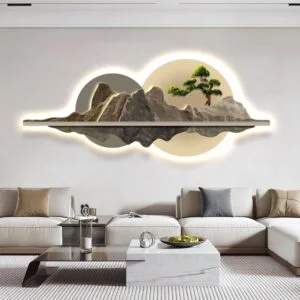 Modern illuminated wall art with mountain and tree design in a luxury living room.