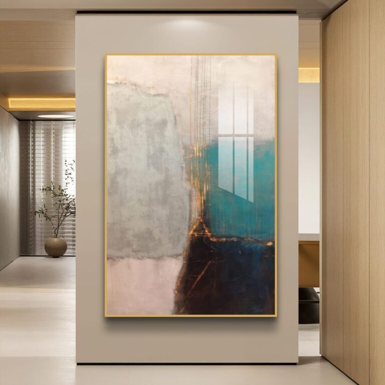 Modern abstract wall art with gold frame in a luxury home interior.