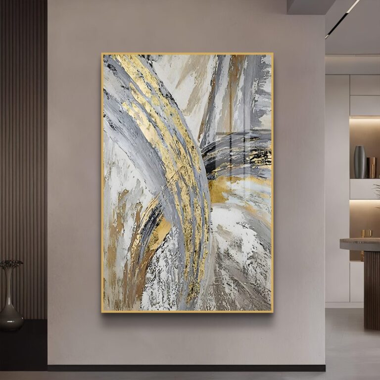 Modern abstract wall art with gold and gray tones in a luxury interior setting.