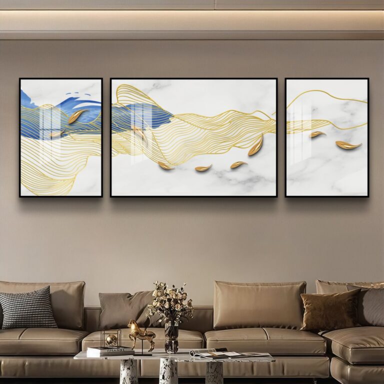 Modern luxury wall art with gold and blue abstract design in a living room setting.