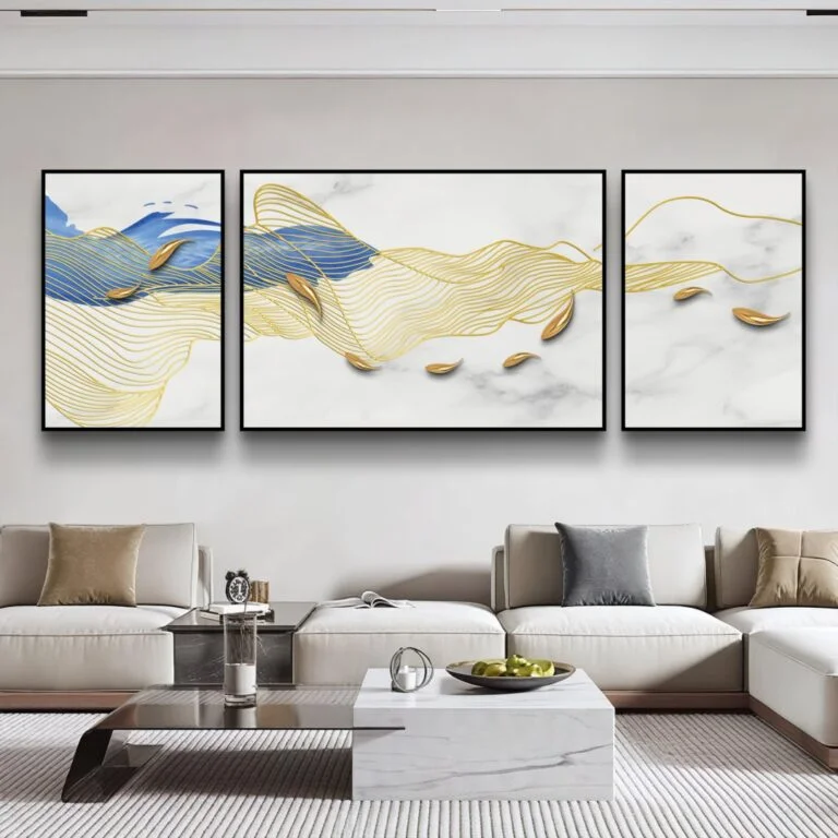 Modern luxury wall art with gold and blue abstract design in a living room setting.
