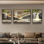 Modern framed wall art with nature scenes in a luxury living room setting.