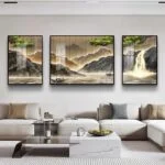 Modern living room with framed landscape wall art and elegant decor.