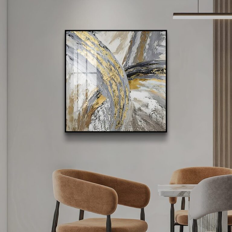 Modern abstract wall art with gold and gray tones in a luxury home setting.