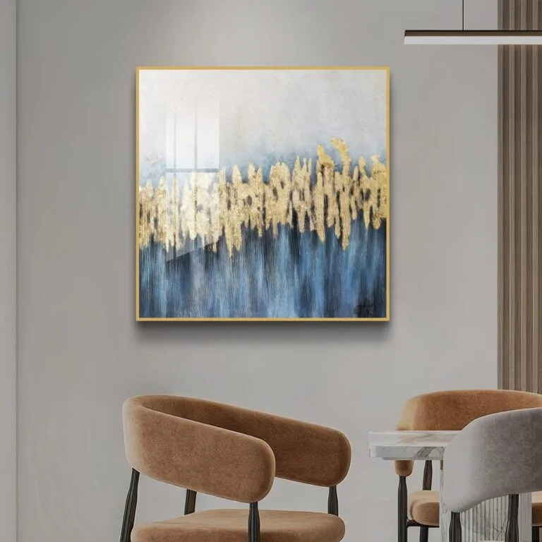 Modern luxury wall art with gold and blue abstract design in a living room setting.