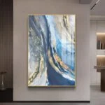 Modern luxury wall art with abstract design in a gold frame, perfect for home decor.