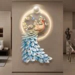 Illuminated peacock wall art with floral accents in a modern living room setting.