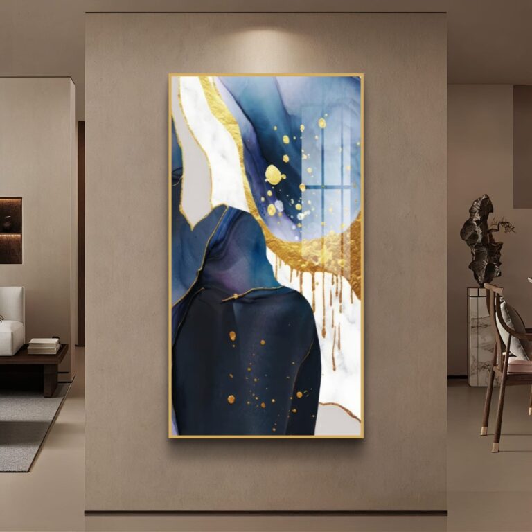 Modern abstract wall art with gold accents in a luxury living room setting.